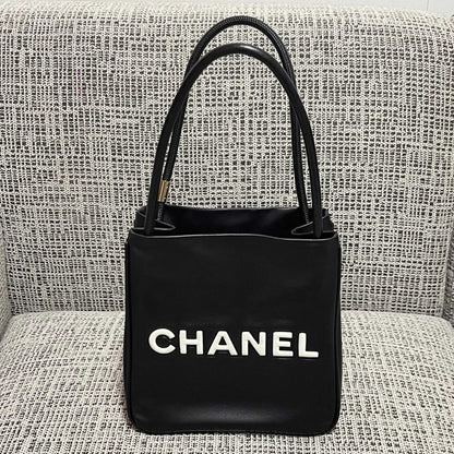 Chanel 2026 Camellia Letter Reversible Tote Bag 25cm Black White Leather